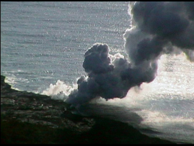 This is the same steam plume we saw when we drove to Volvano Park yesterday, but this time we are able to get pretty close. Lava Creating Steam by the Ocean