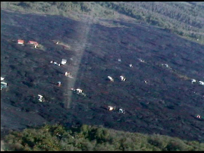 These houses have already been overrun by lava, but the structures are still standing. Spared Houses