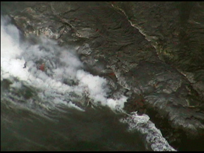 If you look closely, you can see a lot of area with a dull red glow. There is a pretty big arm of lava here. Lava Flowing into the Sea
